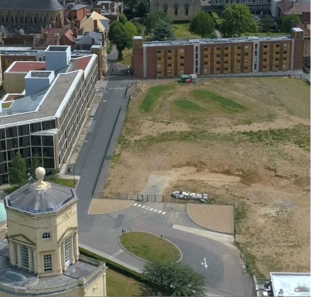 An aerial view of a parcel of empty land within the Radcliffe Observatory quarter in Oxford