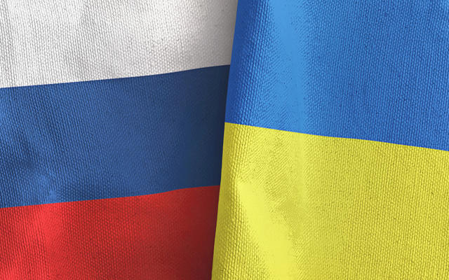 Russian and Ukrainian flags shown side by side