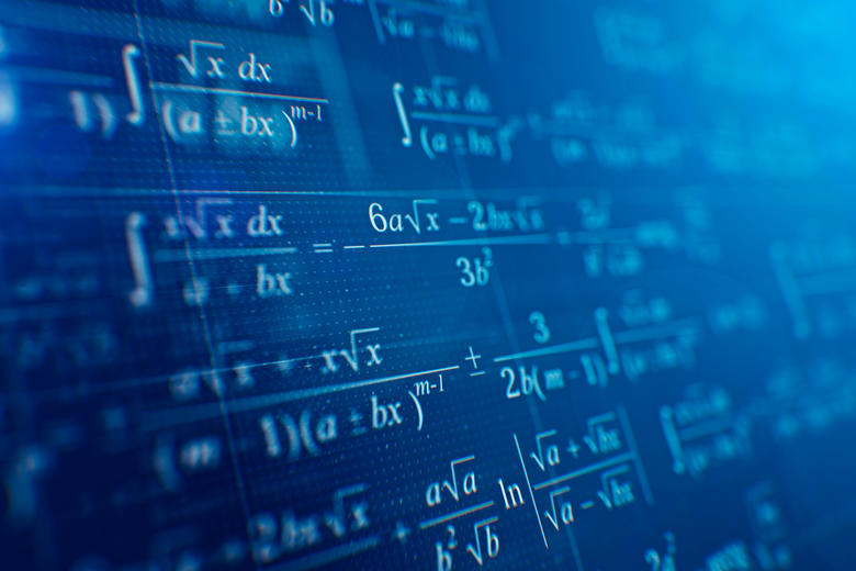 Mathematical formulae against a deep blue background