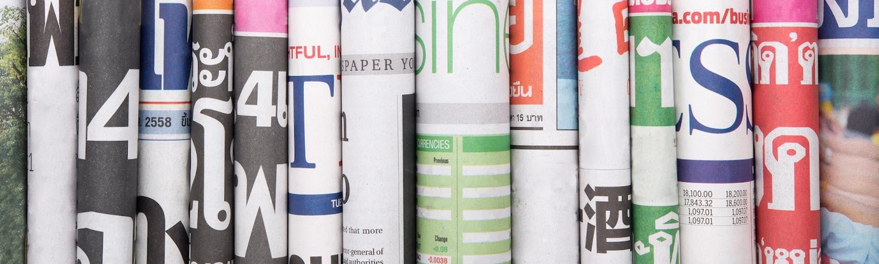 Newspaper article stack