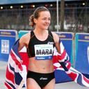 Mara Yamauchi after the finish of the New York Half Marathon, with the Union flag across her shoulders