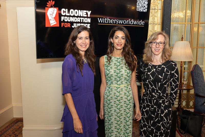 From left to right: Emma Lindsay (global pro bono practice leader and partner at the international law firm Withers), Amal Clooney (human rights lawyer and co-founder of the Clooney Foundation for Justice), and Justine Markovitz (global chairperson of Wit