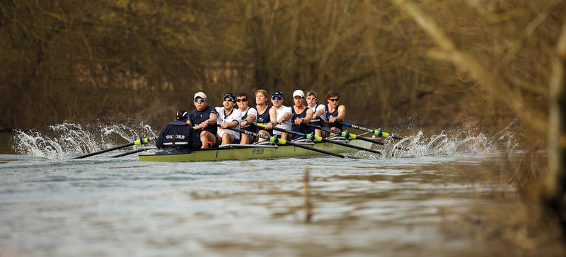 Oxford University rowing team training on the river