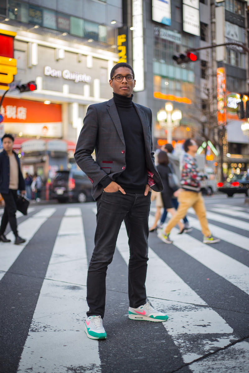 Warren Stanislaus stood on a pedestrian crossing in Tokyo