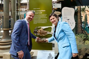 Dr Gavin Svenson and the Vice-Chancellor Irene Tracey install a Megalosaurus jaw bone